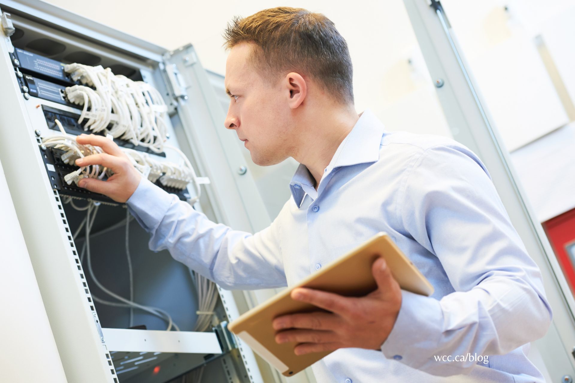 An image of a network administrator trying to fix cyber security concerns in an organization