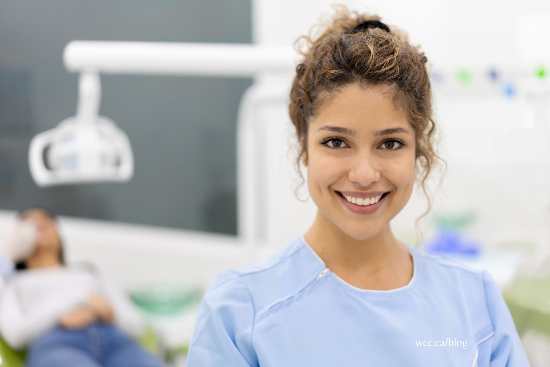 Dental assistant examining patient's teeth without certification